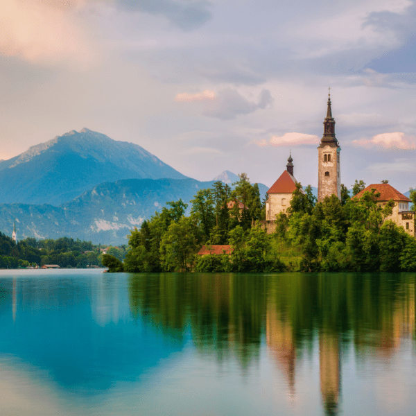 Lake Bled in Slovenia with church on island and mountains in the background