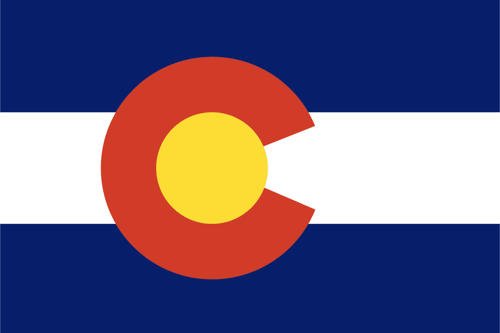 a blue and white stripped flag with a red c and a center yellow circle, which is the Colorado Flag