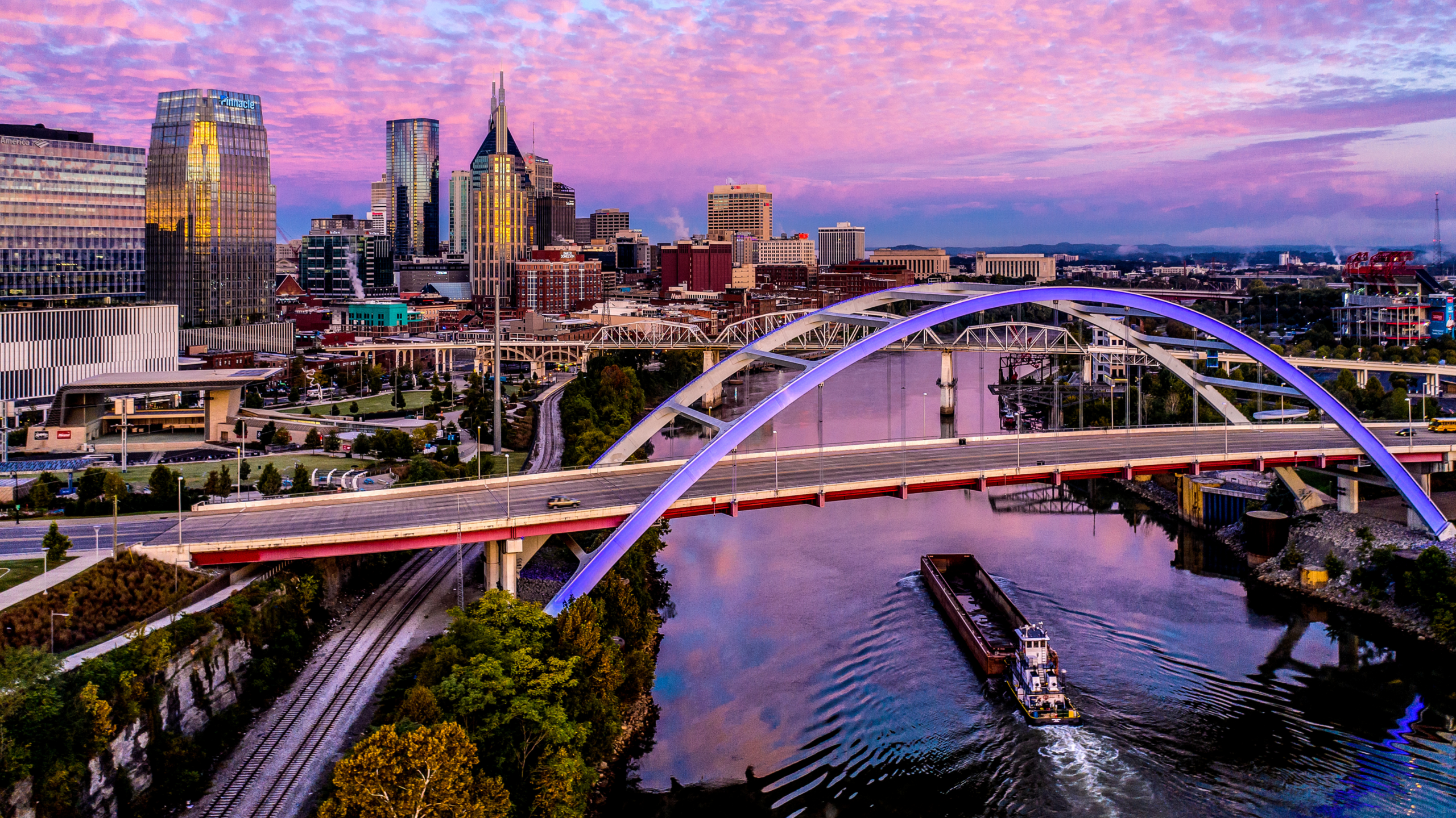 purple sunset in Nashville over the river and cityscape