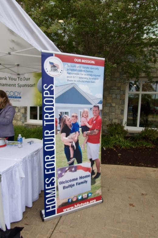 sign at Homes for Our Troops (HFOT) golf tournament