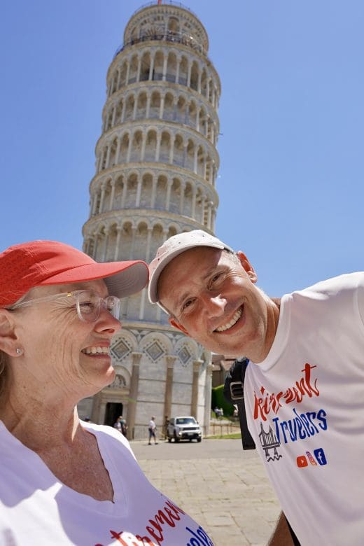 John cutting up in front of leaning tower of pisa