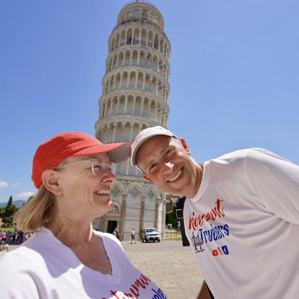 John cutting up in front of leaning tower of pisa
