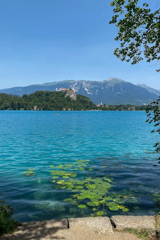 deep aqua water with view of island and church Lake Bled in Slovenia
