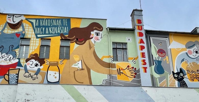 mural of cartoonish people cooking and eating