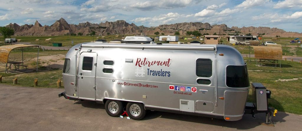 a view of the airstream with badlands park in the background