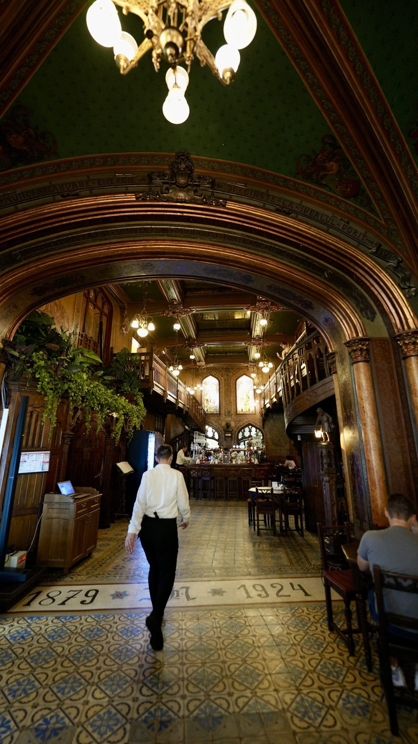 waiter walking through restarant