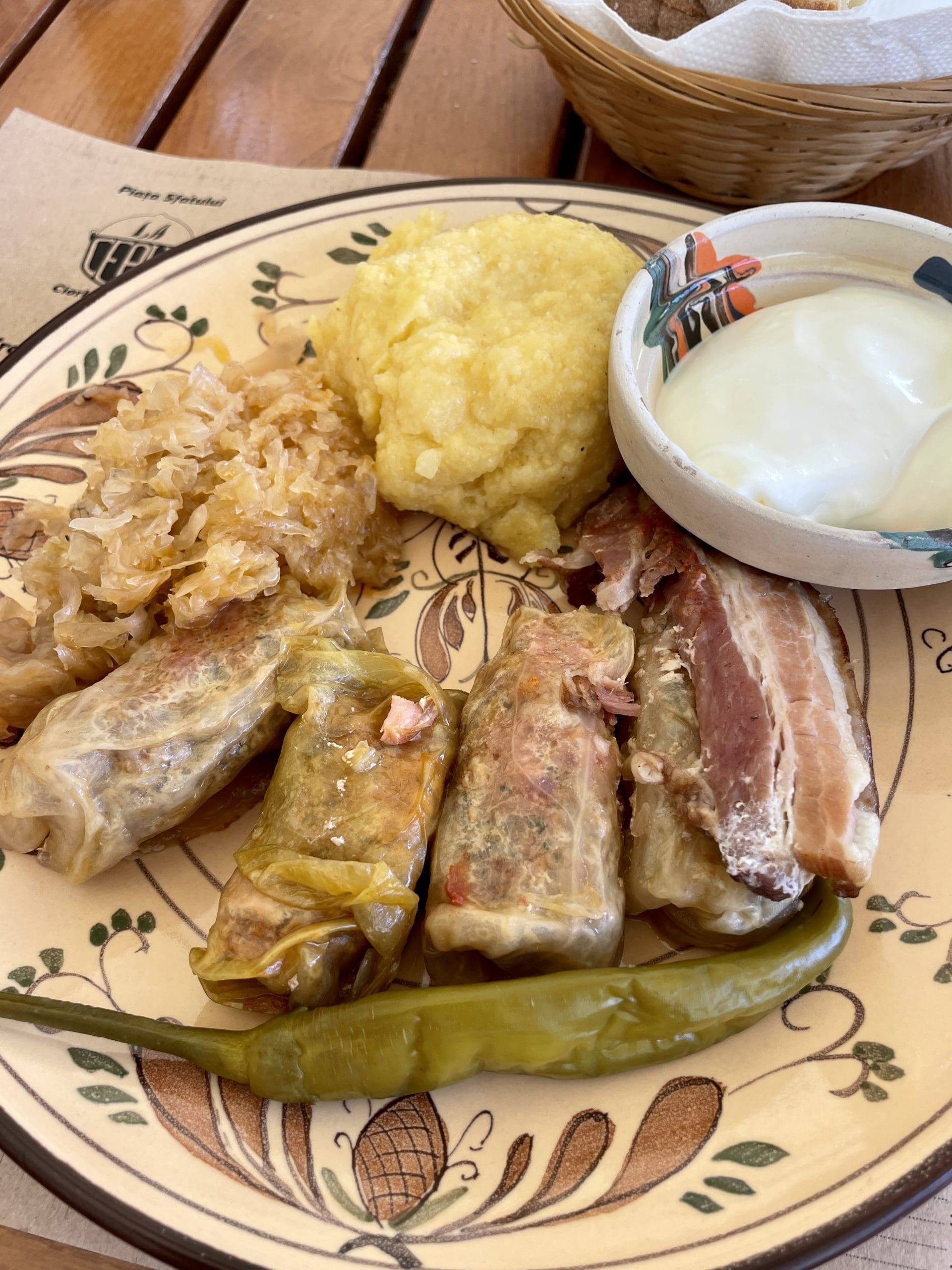 cabbage rolls and other items on plate