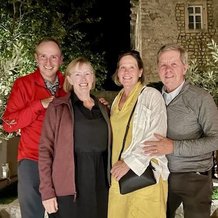 two couples posing for a photo