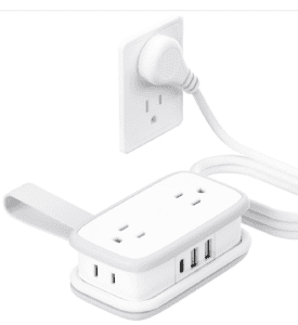 White Power strip with four plugs, a c port and two USB ports. Cord wraps around the base